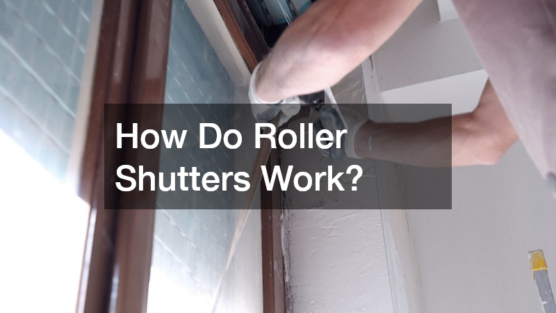 Man adjusting roller shades